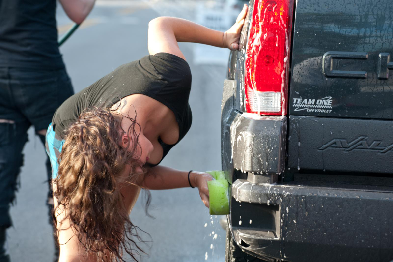Illustration for article titled Noir Leather Bikini Car Wash Meetup Pictures